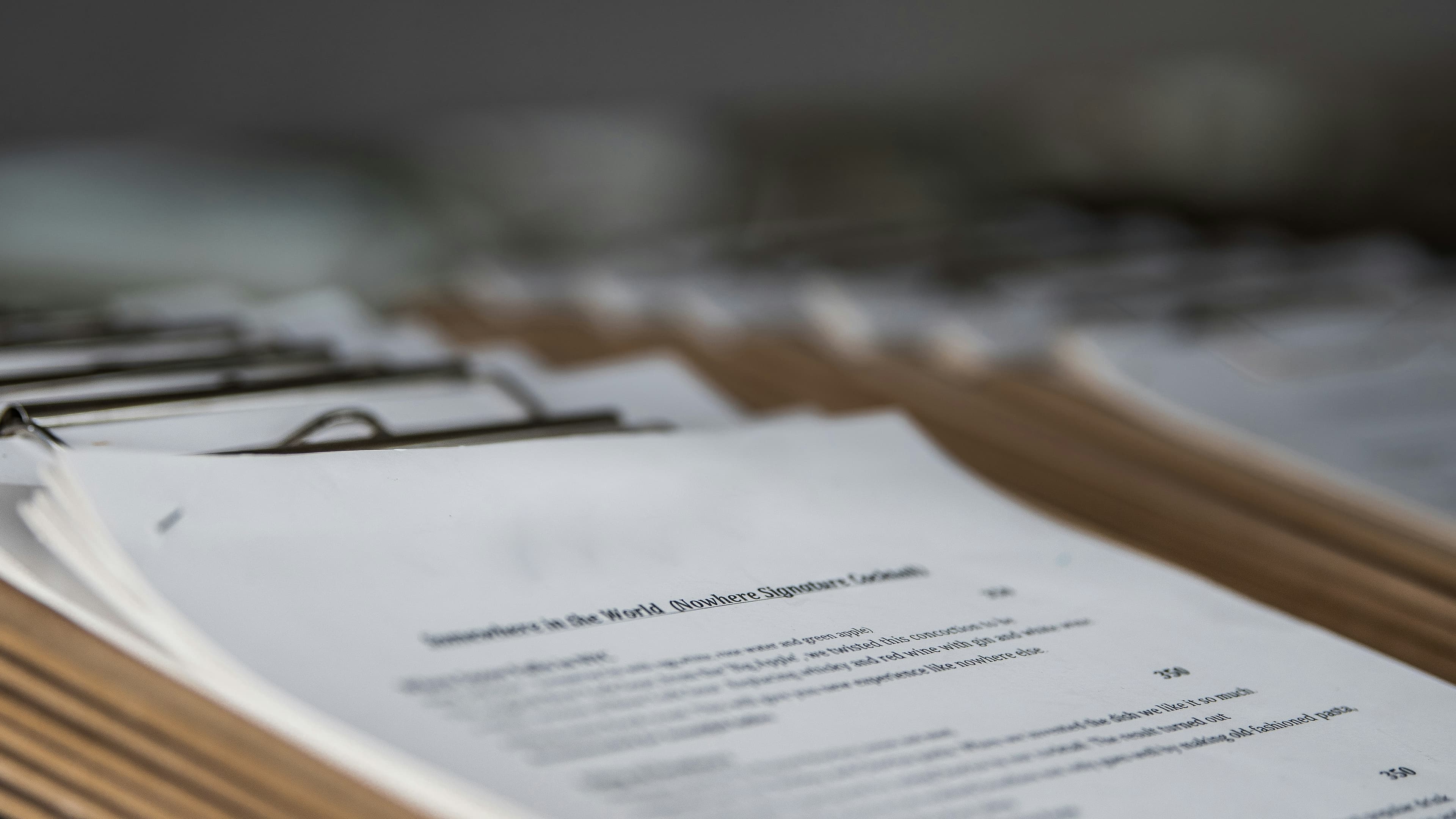 Close-up of printed documents and paperwork on a desk